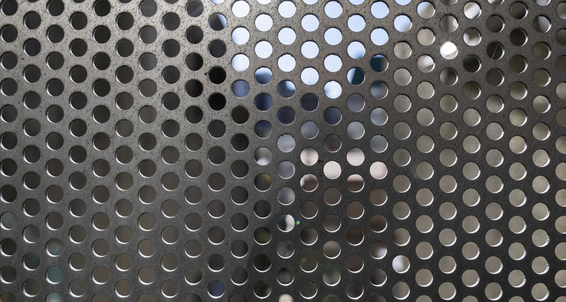 Perforated and decorative metal screens for modern architectural projects